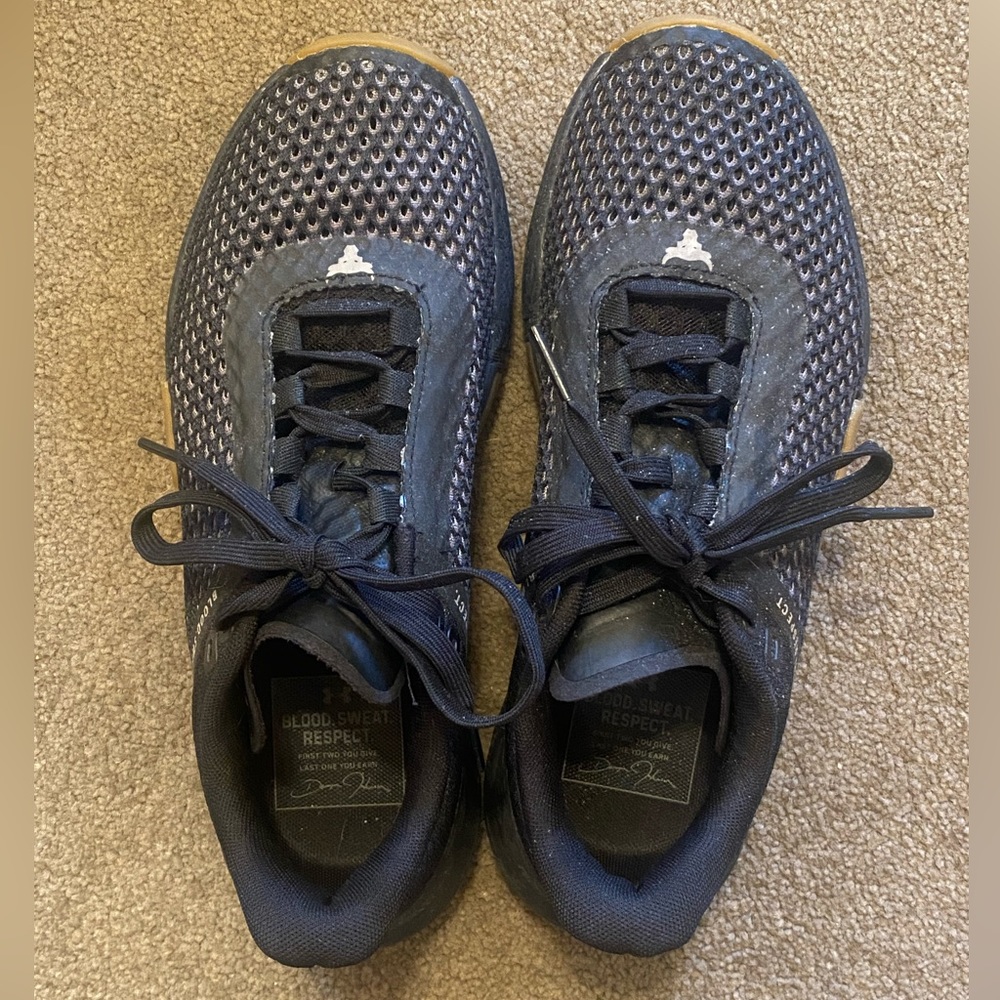 Under Armour training shoes. The Rock’s brand.